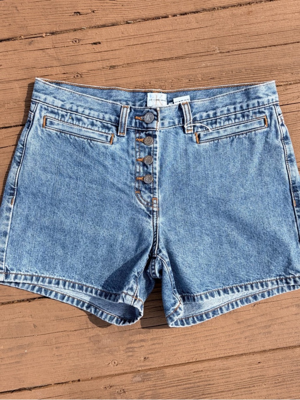 Vintage 90’s Y2K medium wash Calvin Klein button fly mid-rise Jean shorts